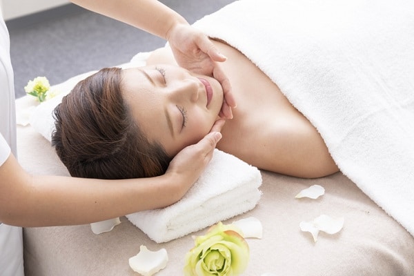 Soft, warm textures on a massage table help clients stay comfortable